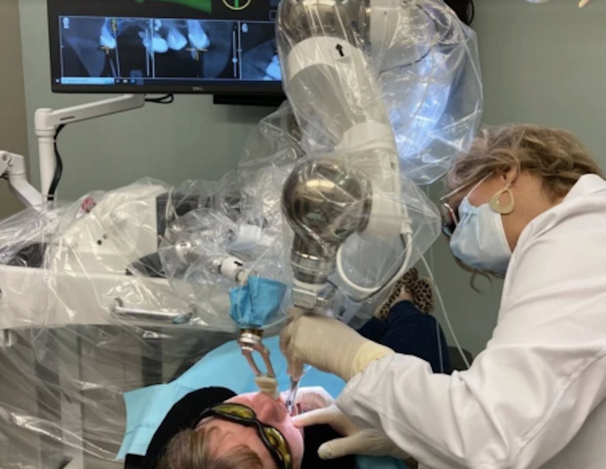 Dr. Leslie Barrilleaux — implant dentist serving Madison AL with Yomi robotic guidance